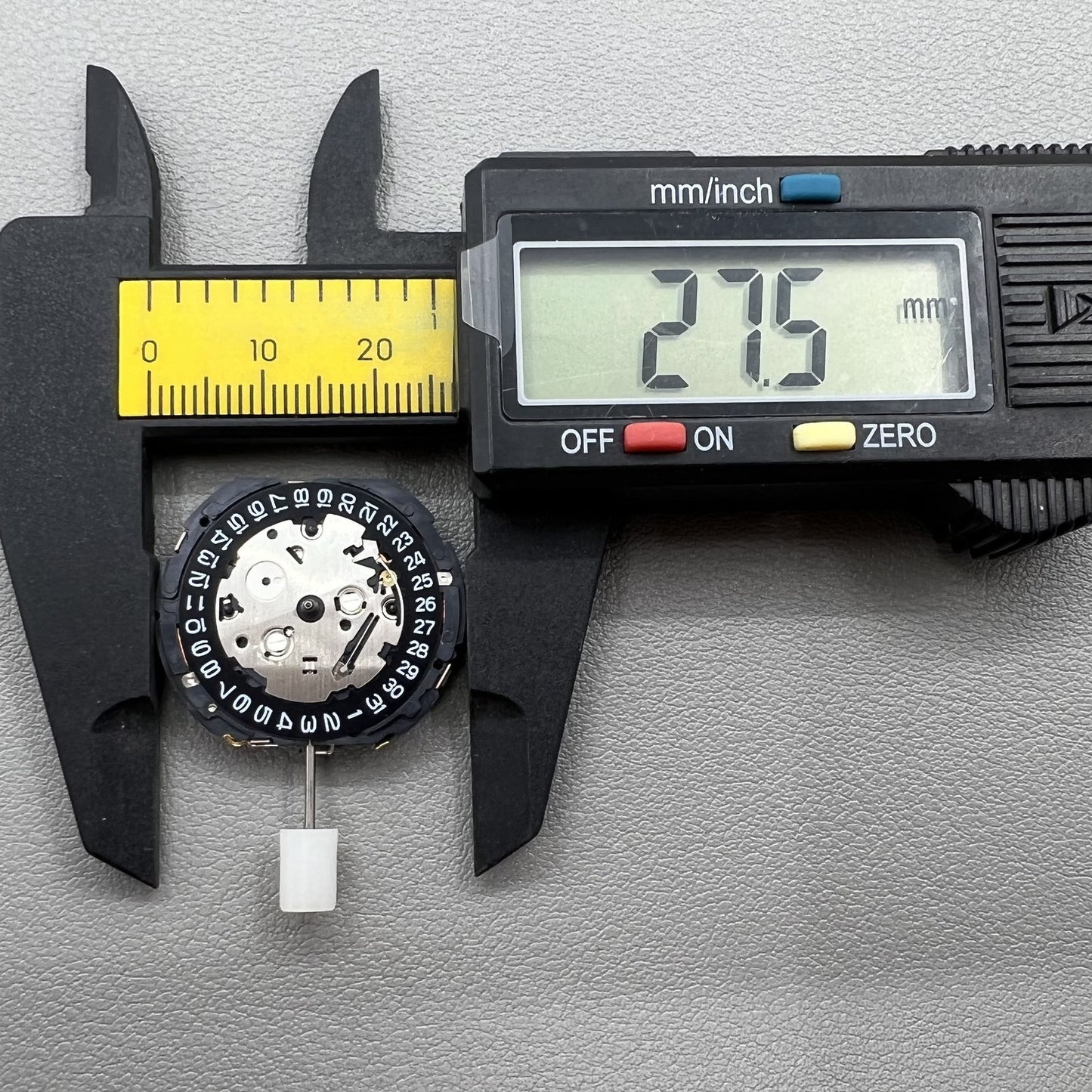 Japan Seiko 7T85A quartz watch movement, precise chronograph mechanism for durable watch performance.