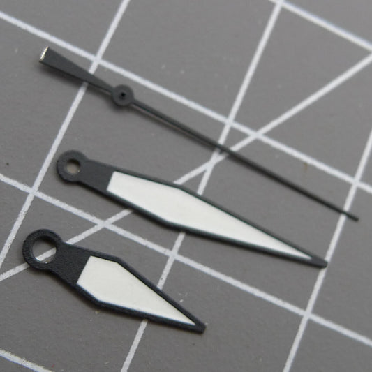 White diamond-shaped orange lume watch hands designed for ETA2836/2846/2824/2846 movements by White+diamond.