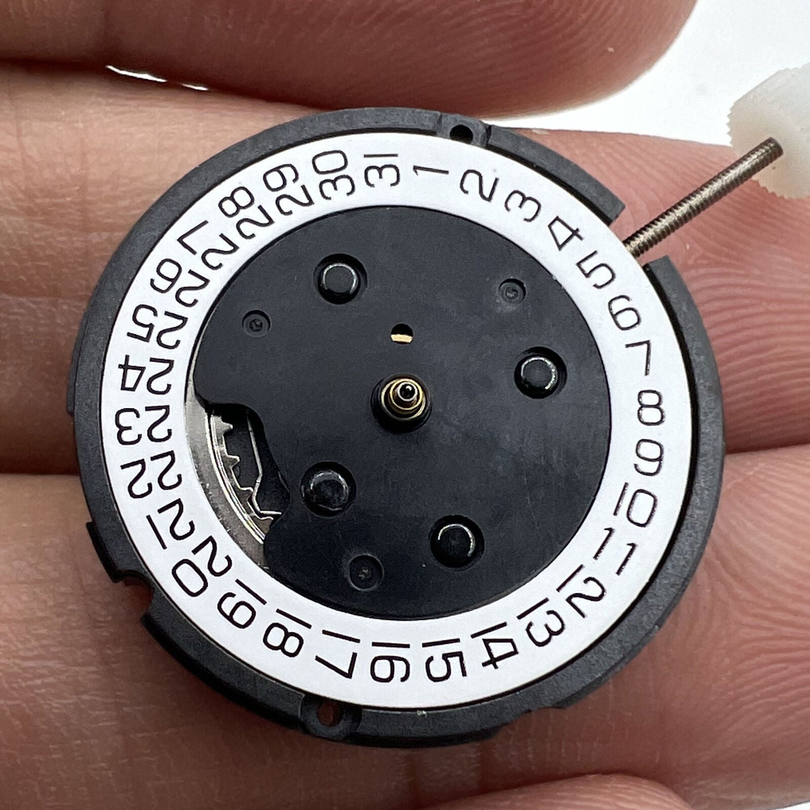 Swiss Made ETA804.192 quartz watch part with single calendar at 3 o'clock for precise timekeeping.