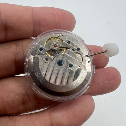 Shanghai LB20 automatic watch showcasing moon phase at 6 o'clock and big date at 12, Chinese craftsmanship elegance