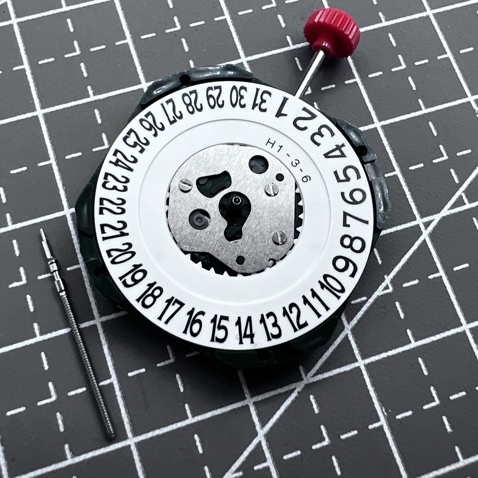 Japan Miyota 2315 quartz watch movement with three hands and date at 6 o'clock, crown pin included