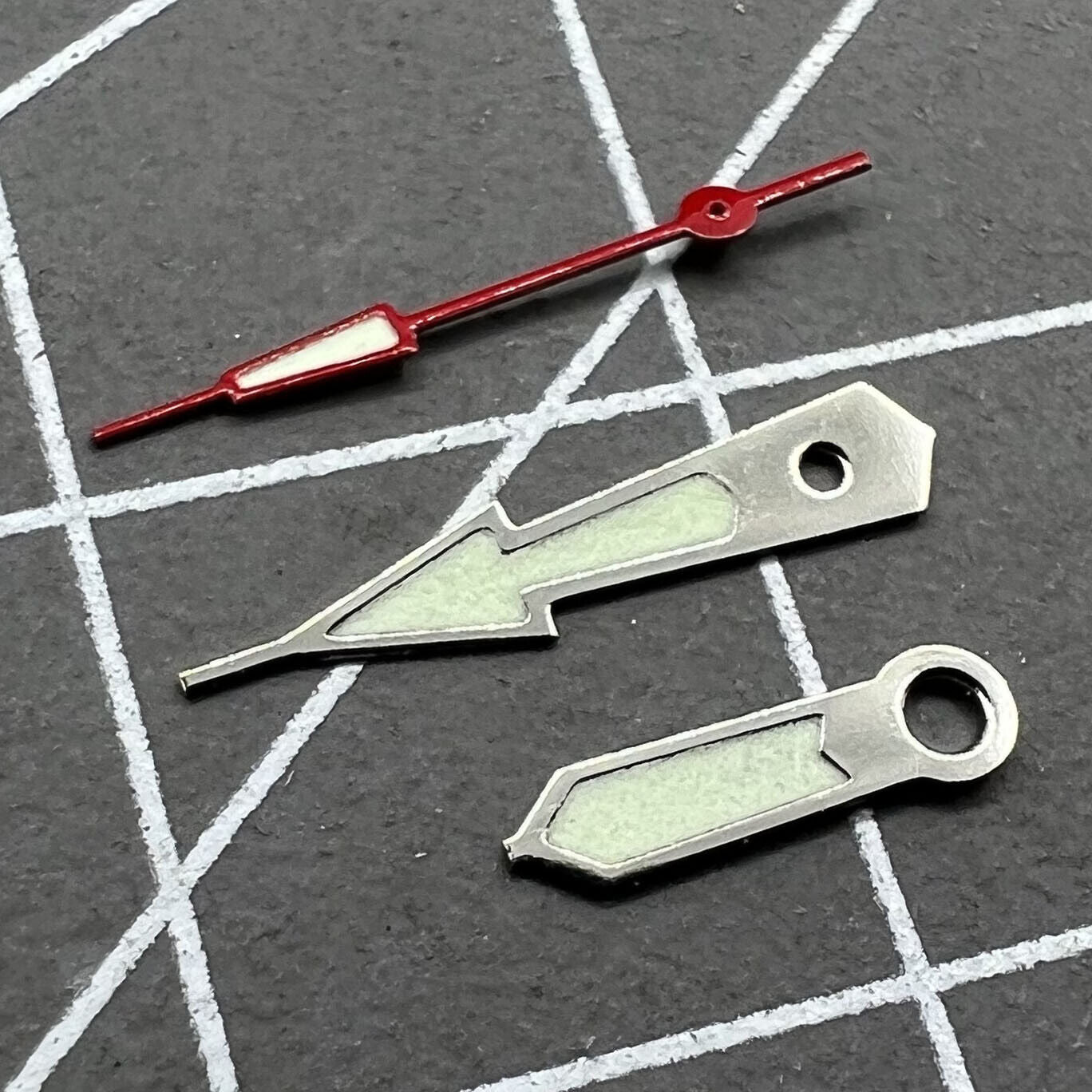 Silver-trimmed 14mm green lume watch hands set for Miyota 2035 with precision design.