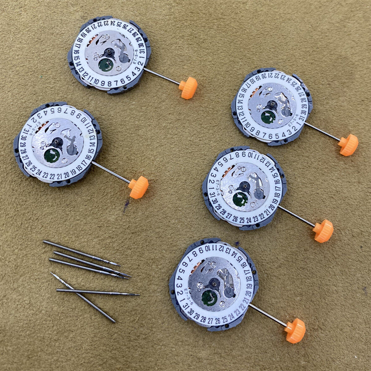 Miyota 1N12 Japan quartz watch movement with date at 6, precise replacement part for repairs.