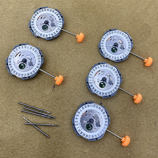 Miyota 1N12 Japan quartz watch movement with date at 6, precise replacement part for repairs.
