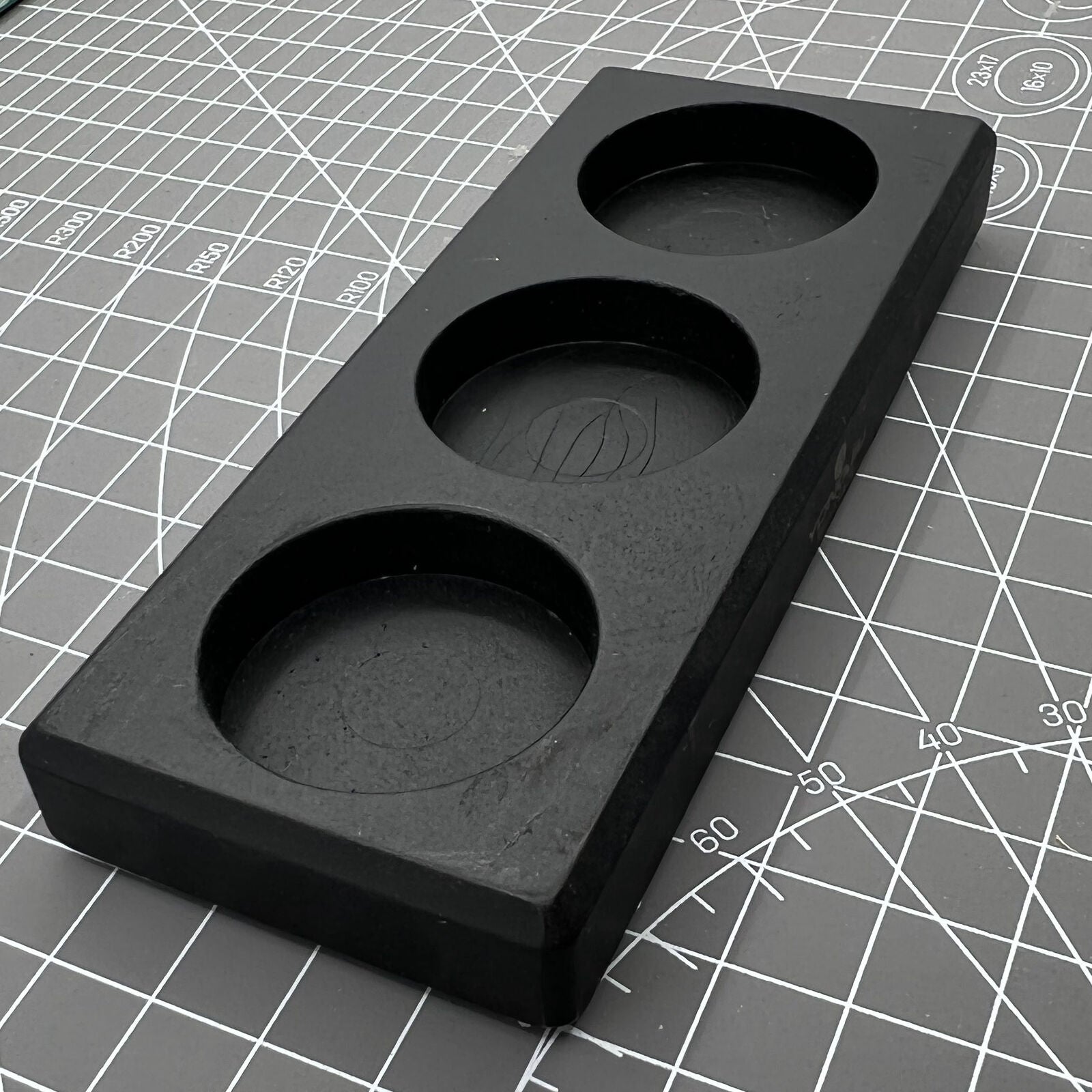 Black stand holder for Automatic Precision Oilers BG 7718-7720, ensuring stable and organized tool storage.