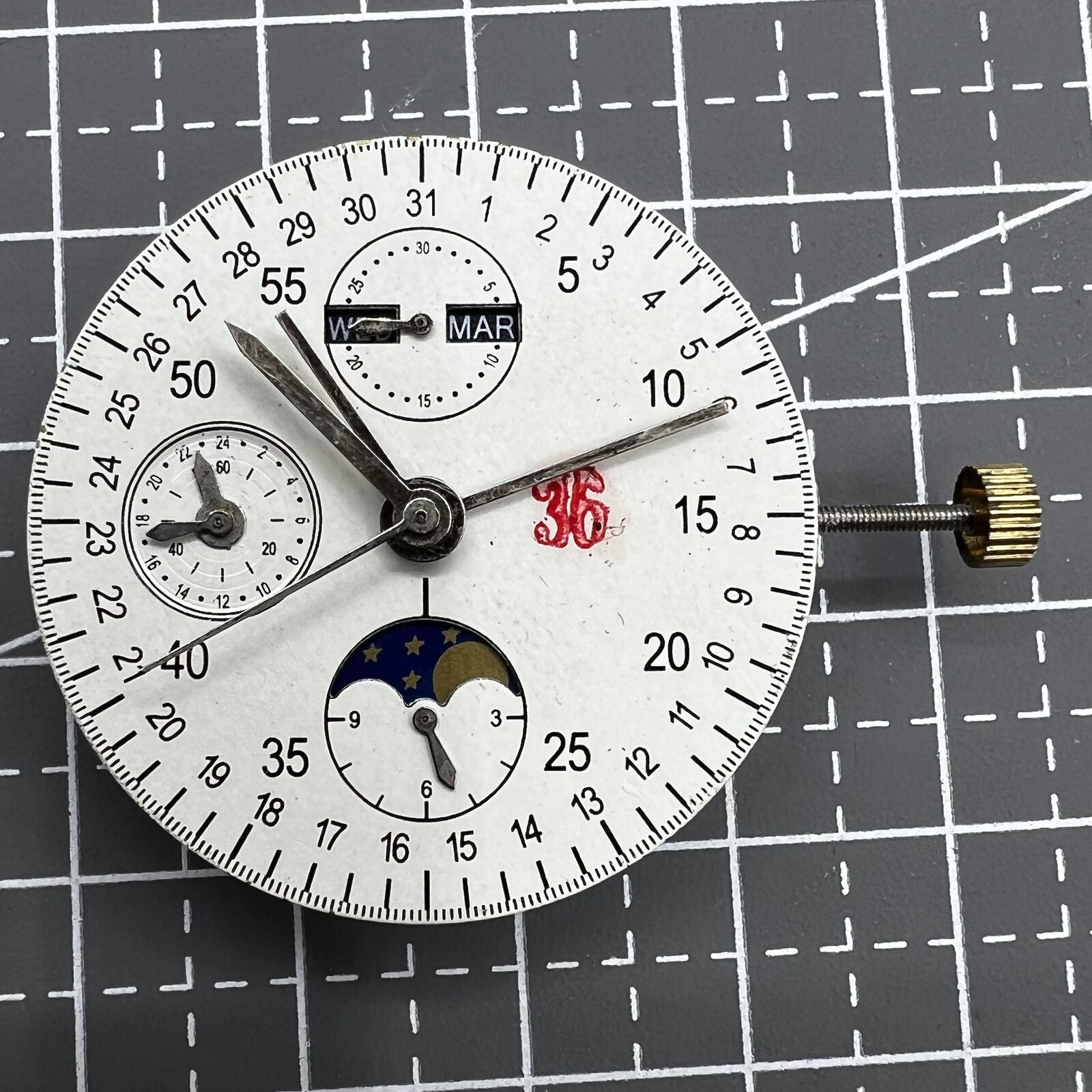 Multifunctional automatic watch with 8 hands featuring Dandong 7751 mechanical movement.