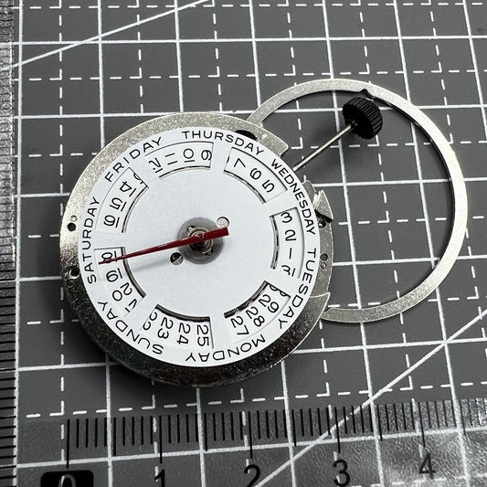 ST2147 automatic mechanical watch showing day at 12 and date at 3, sleek design.