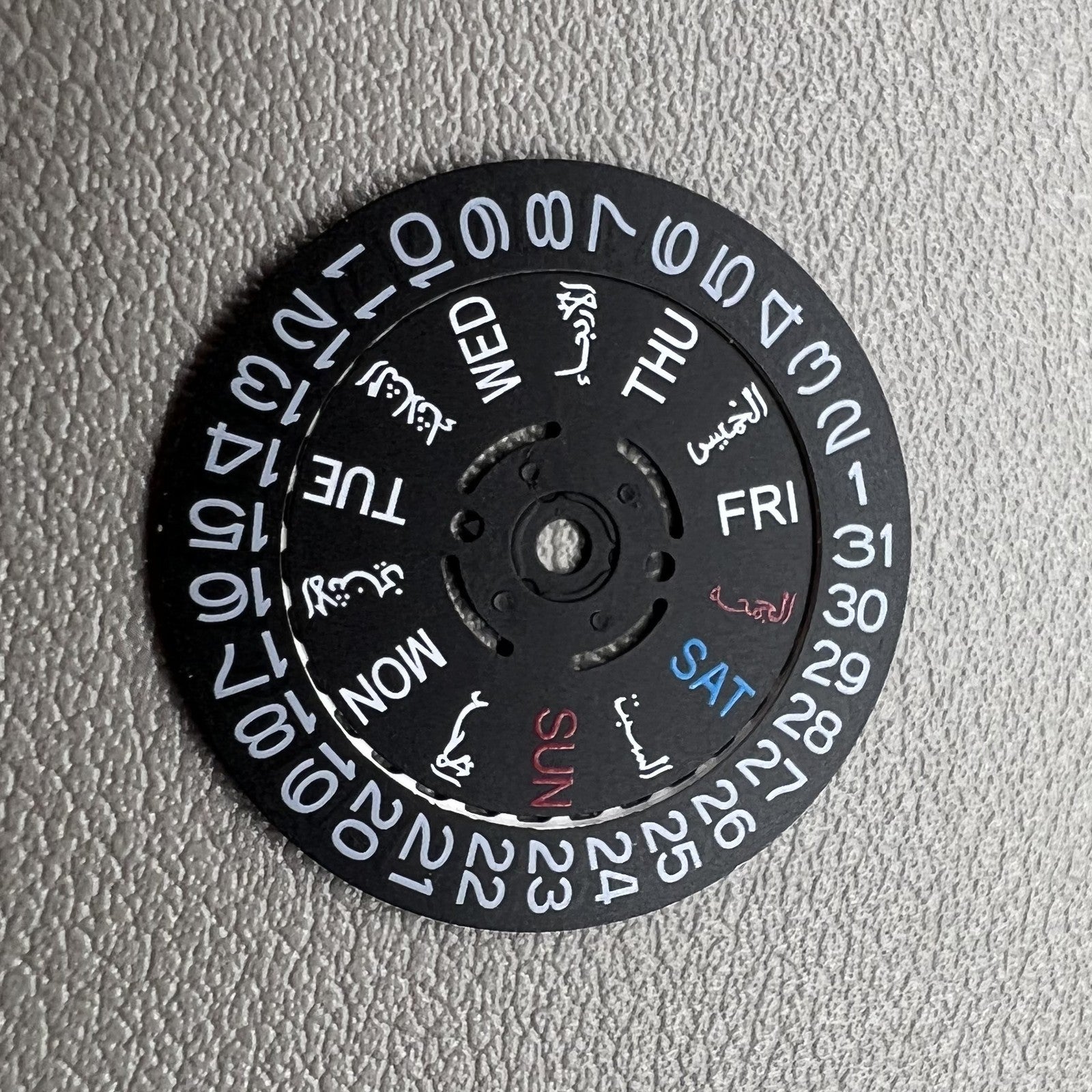 Black Arabic/English date and week wheel for NH36 watch movement by Seiko, crown at 3 o'clock.