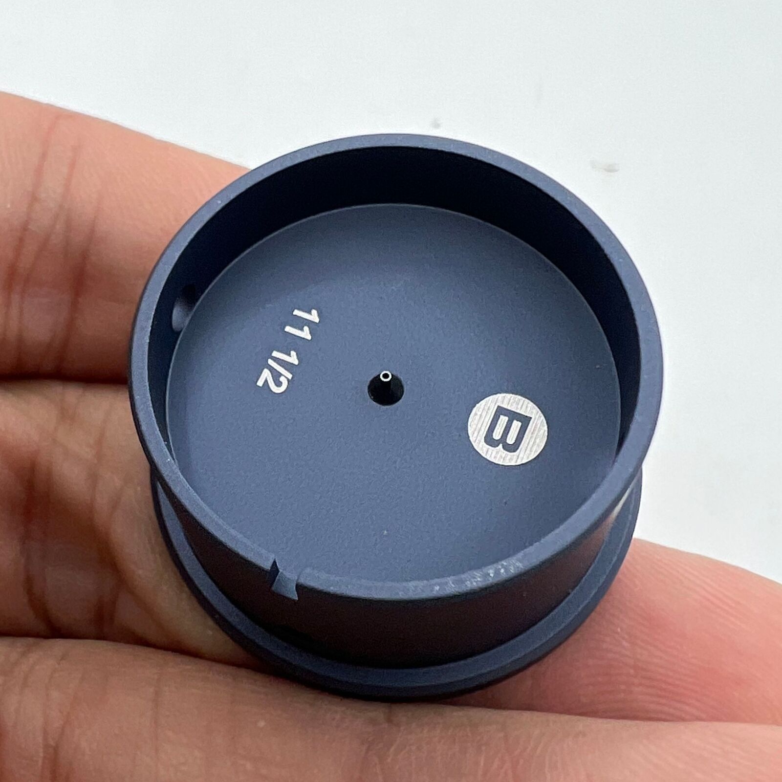 Bergeon 7100-11 1/2 watch movement holder securing Swiss watch parts for repair and maintenance.