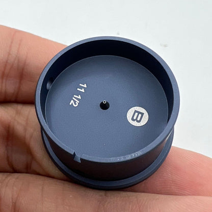 Bergeon 7100-11 1/2 watch movement holder securing Swiss watch parts for repair and maintenance.