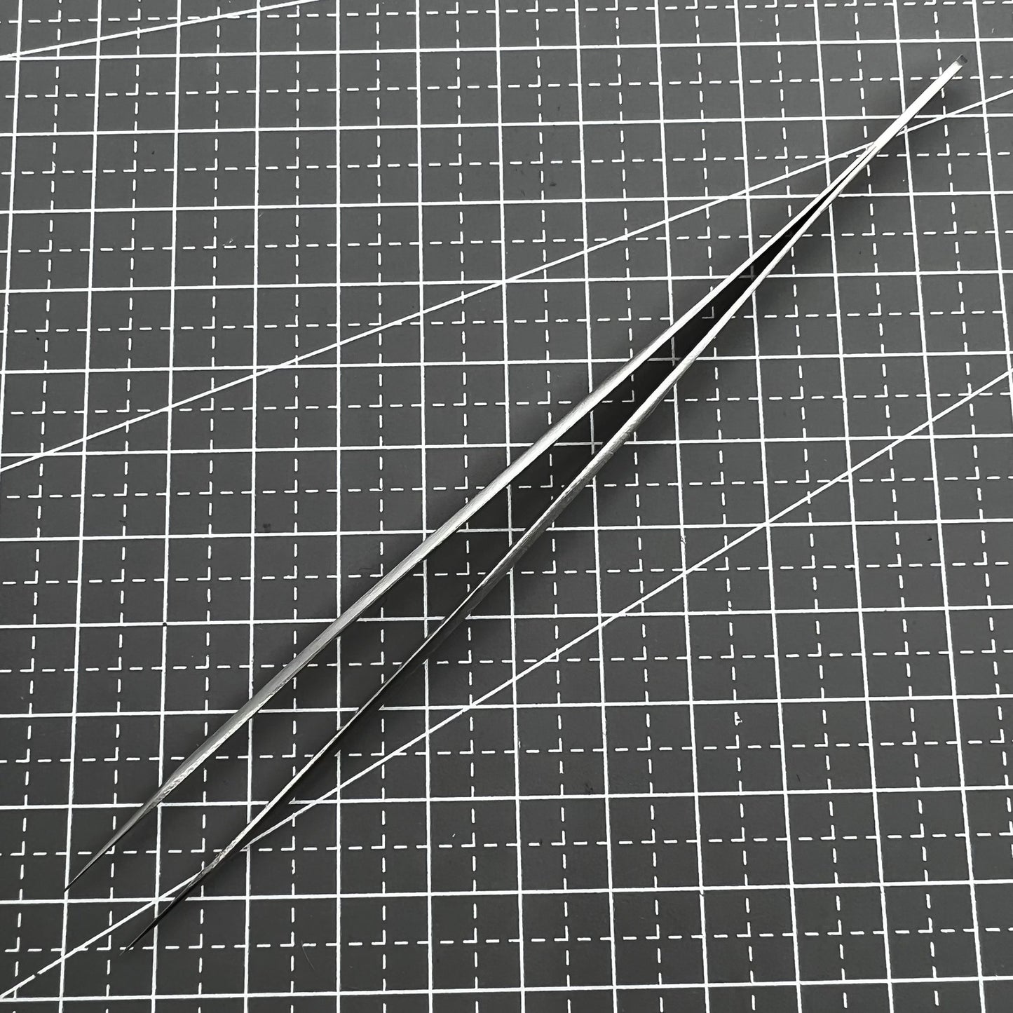 ST11 Superhard Antimagnetic Tweezer by Edelstahl, precision tool for watch repair and delicate accessory handling.