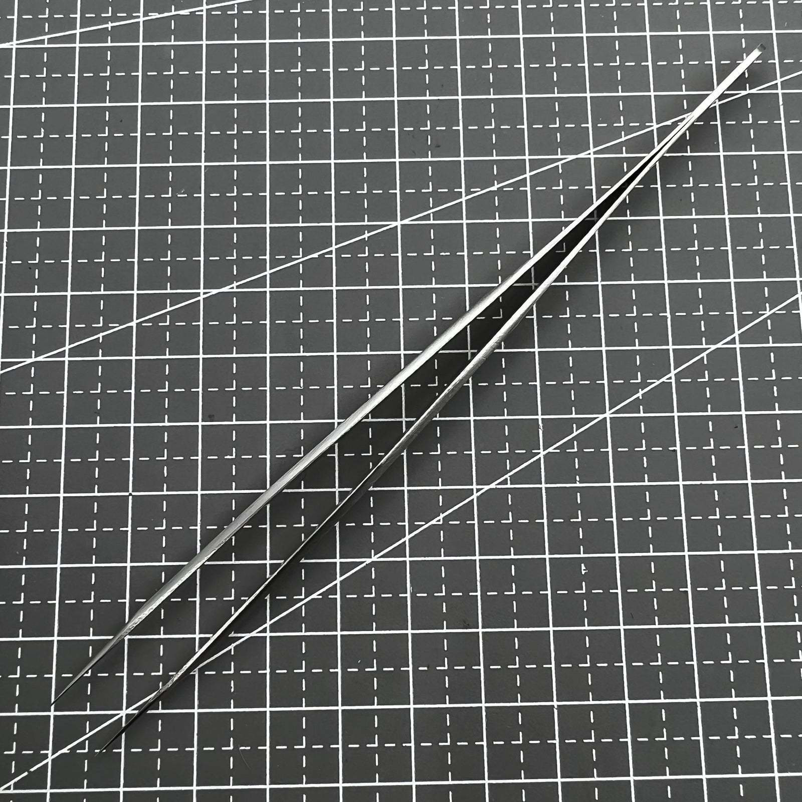 ST11 Superhard Antimagnetic Tweezer by Edelstahl, precision tool for watch repair and delicate accessory handling.