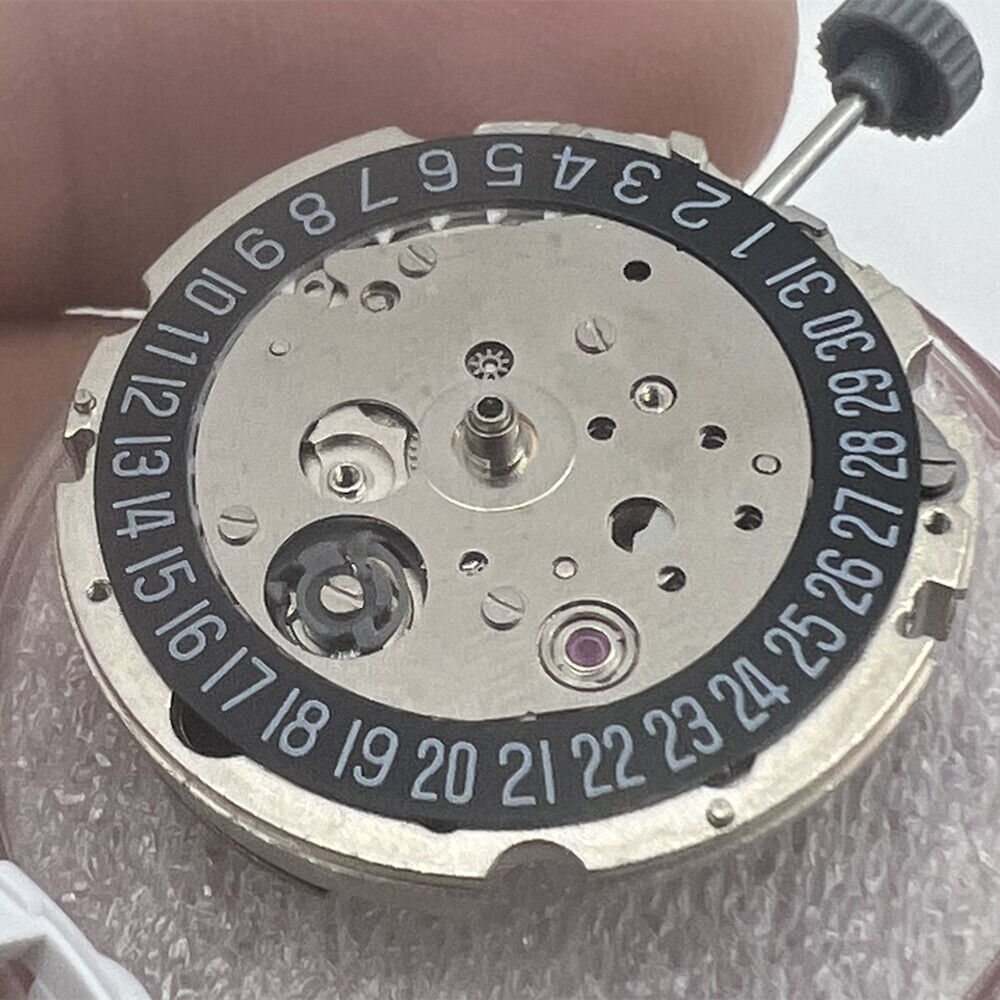 Miyota/Citizen 8215 automatic movement watch with black dial and date display at 6 o'clock.