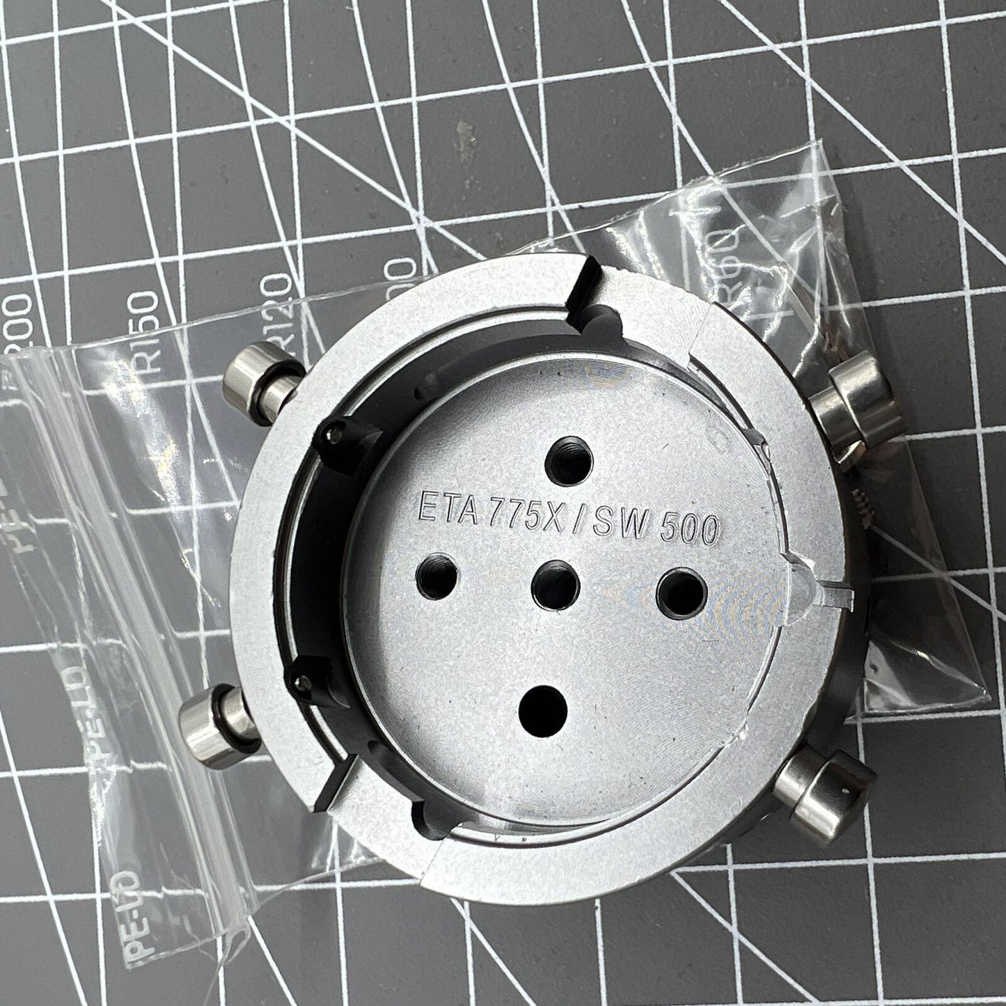 ETA 7750 watch movement holder, securing standard caliber for accurate repairs and assembly.