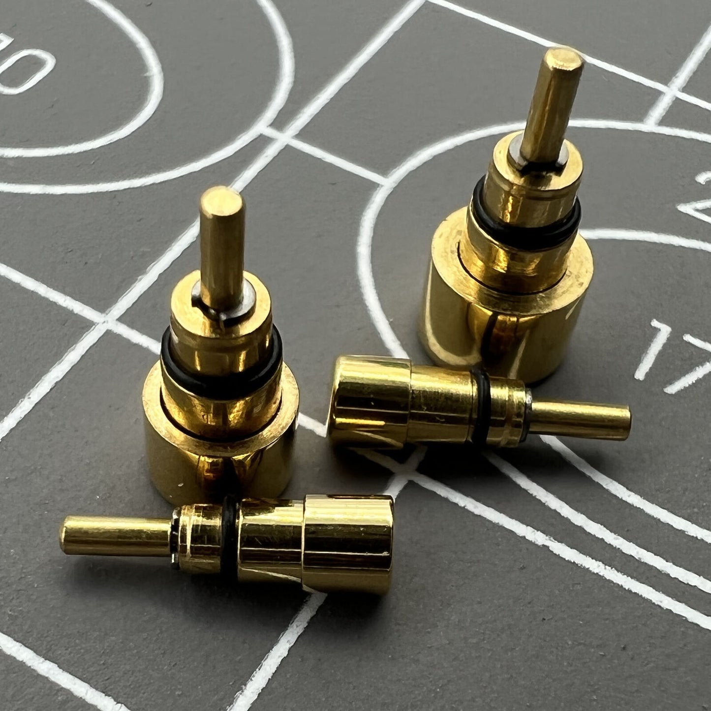 Set of 26 stainless steel golden watch pushers, 13 sizes for precise drive-in adjustments.