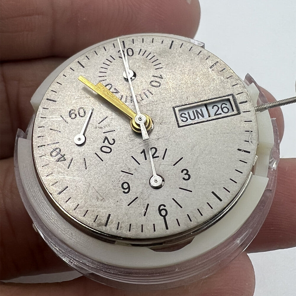 New China SHANGHAI 7750 automatic watch movement showing day, date, and small seconds at 9 o'clock.