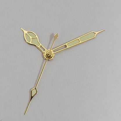 Green luminous watch hands with black and gold trim compatible with NH35, NH36, 4R, and 7S movements.