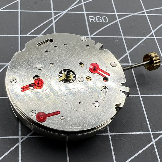 26.5mm Dandong 7120 automatic mechanical watch movement with multi-function features for watch repair.