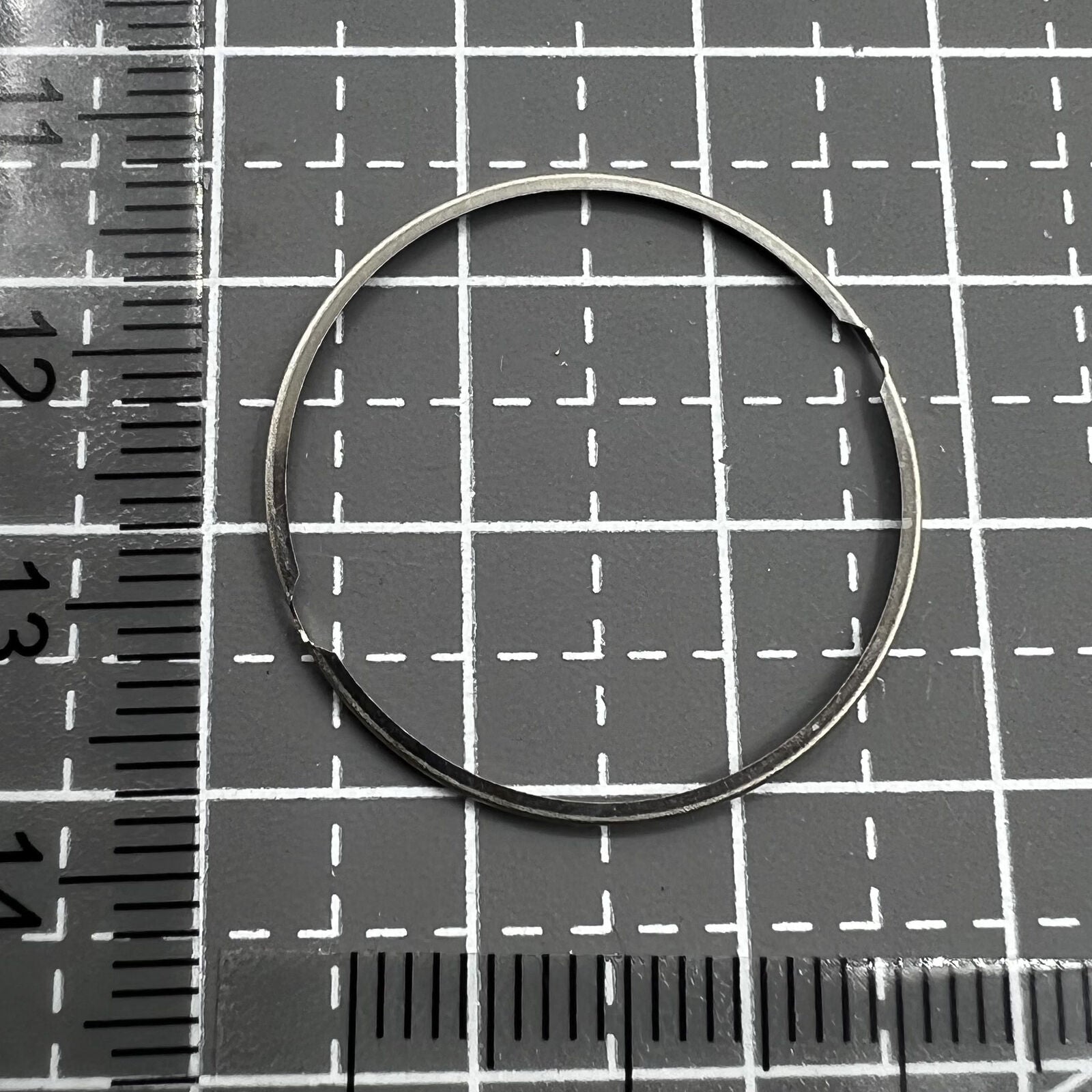 Steel watch case cushion mount spacer ring for SW200/220/240 movements, enhancing durability and fit.