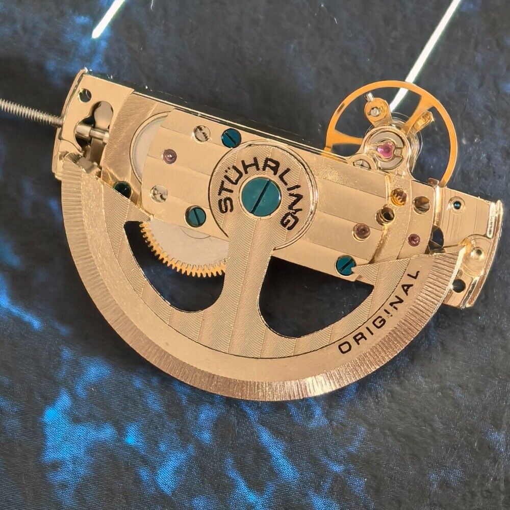 Silver Kunlun watch part showcasing hollow automatic mechanical movement for precise timekeeping, crafted in China.