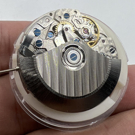 China SHANGHAI 7750 black watch accessory featuring automatic mechanical movement with day, date, and small seconds at 9 o?clock.