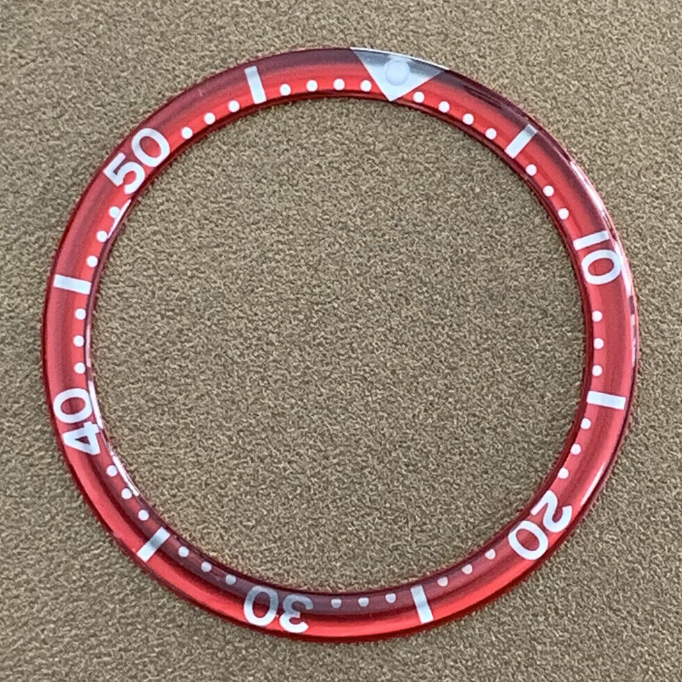 White font 39mm aluminum bezel insert with circular arc bevel for watch customization.