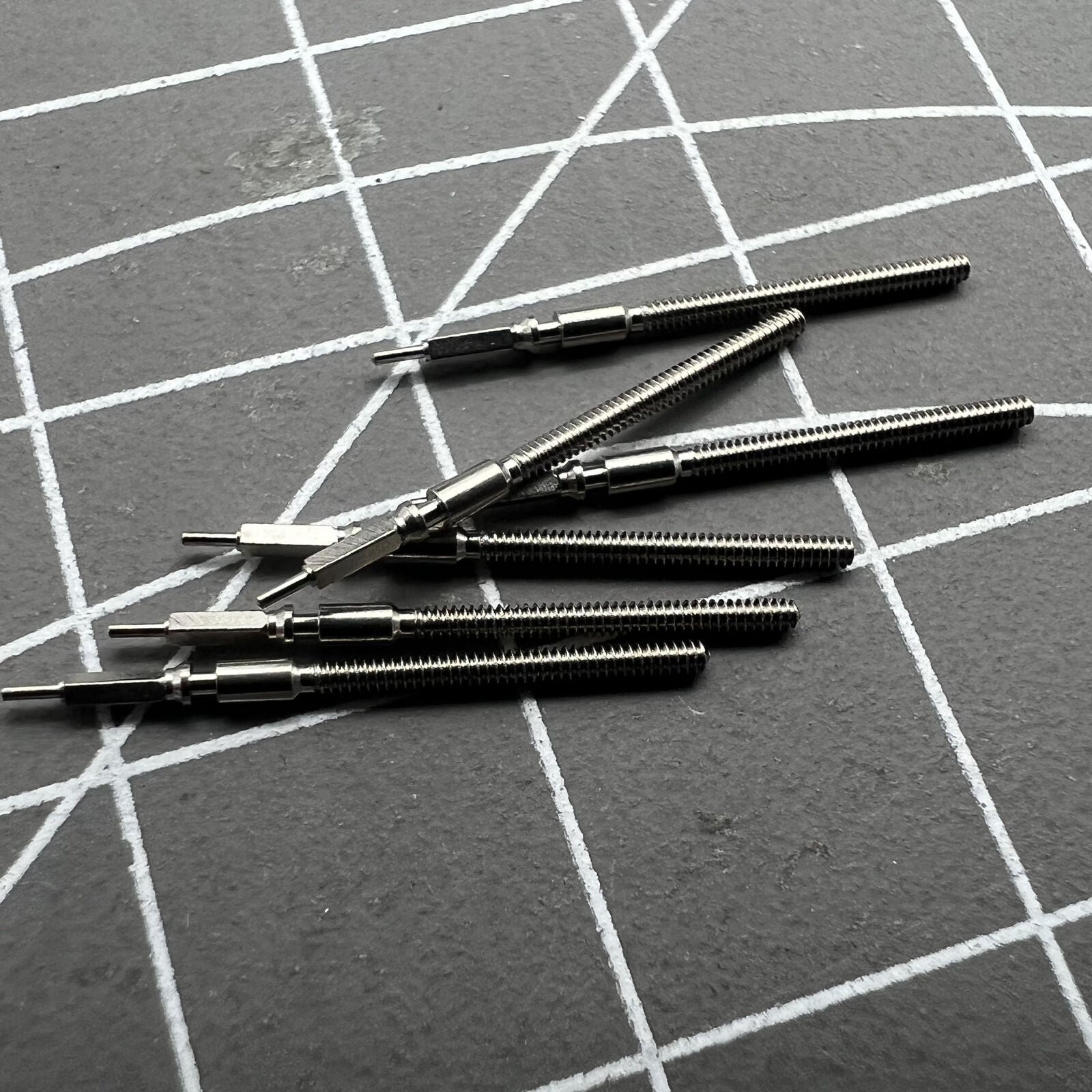 Watch winding stem for Shanghai 2824 movement, high-quality replacement part for precise timekeeping.