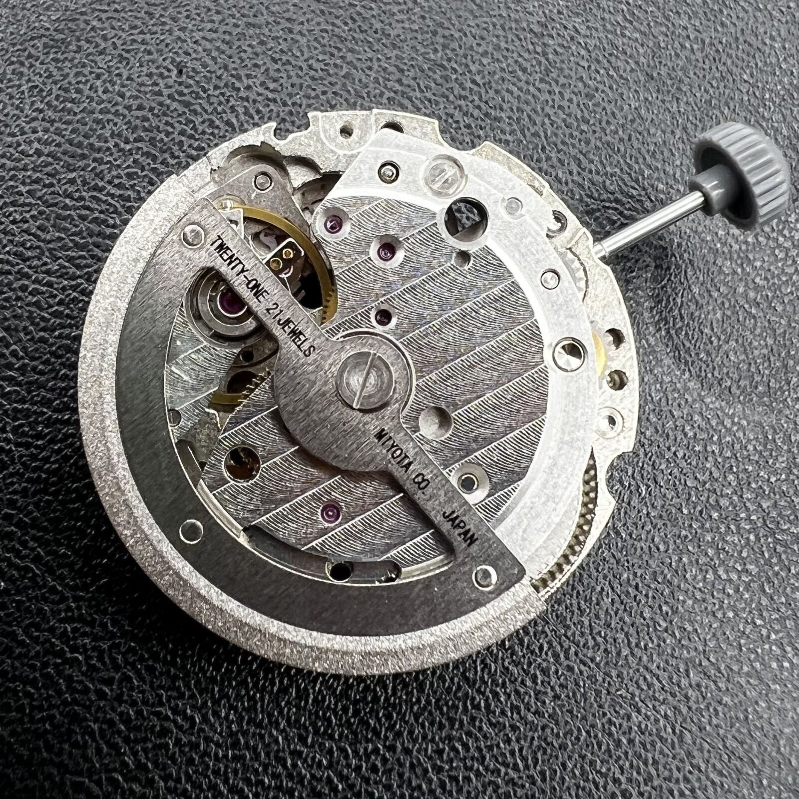 Miyota 8245 silver automatic movement by Citizen, precision-engineered for reliable watch accessories.
