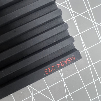 Swiss Horotec black silicon bench mat with 32 grooves for secure watch accessory placement