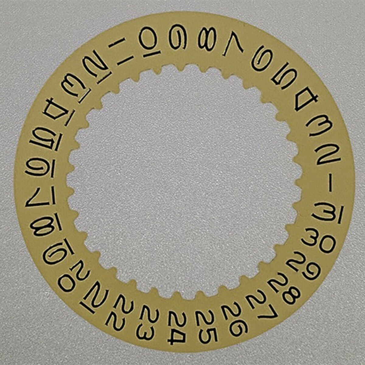 Golden vintage numeral date wheel for 3135 movement, enhancing watch accessory style and function.