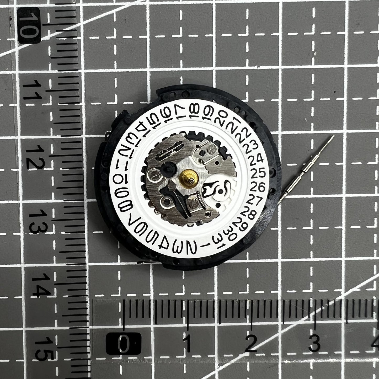 Seiko 5M62A quartz watch movement with date at 3 o'clock, reliable Japanese craftsmanship.