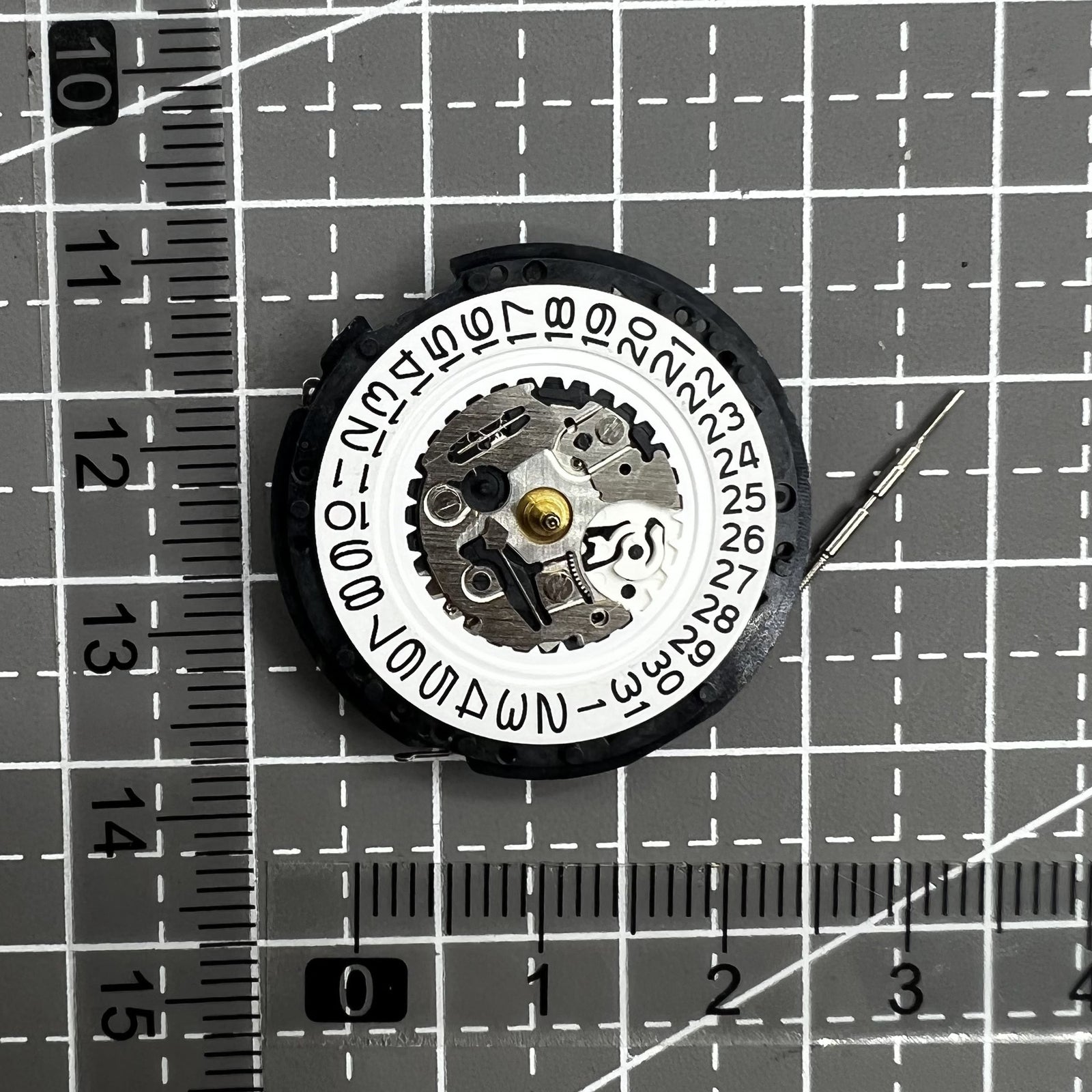 Seiko 5M62A quartz watch movement with date at 3 o'clock, reliable Japanese craftsmanship.
