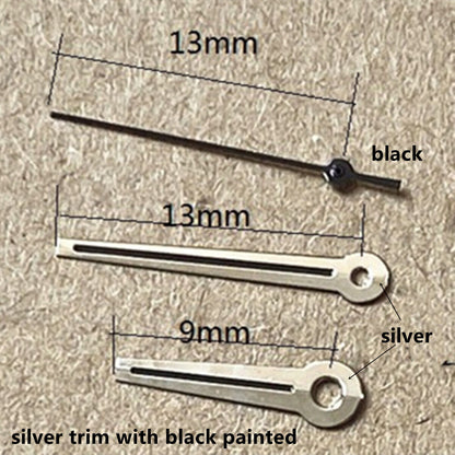 Silver 13mm watch hands with black paint, compatible with Ronda 515 quartz movement, sleek design.