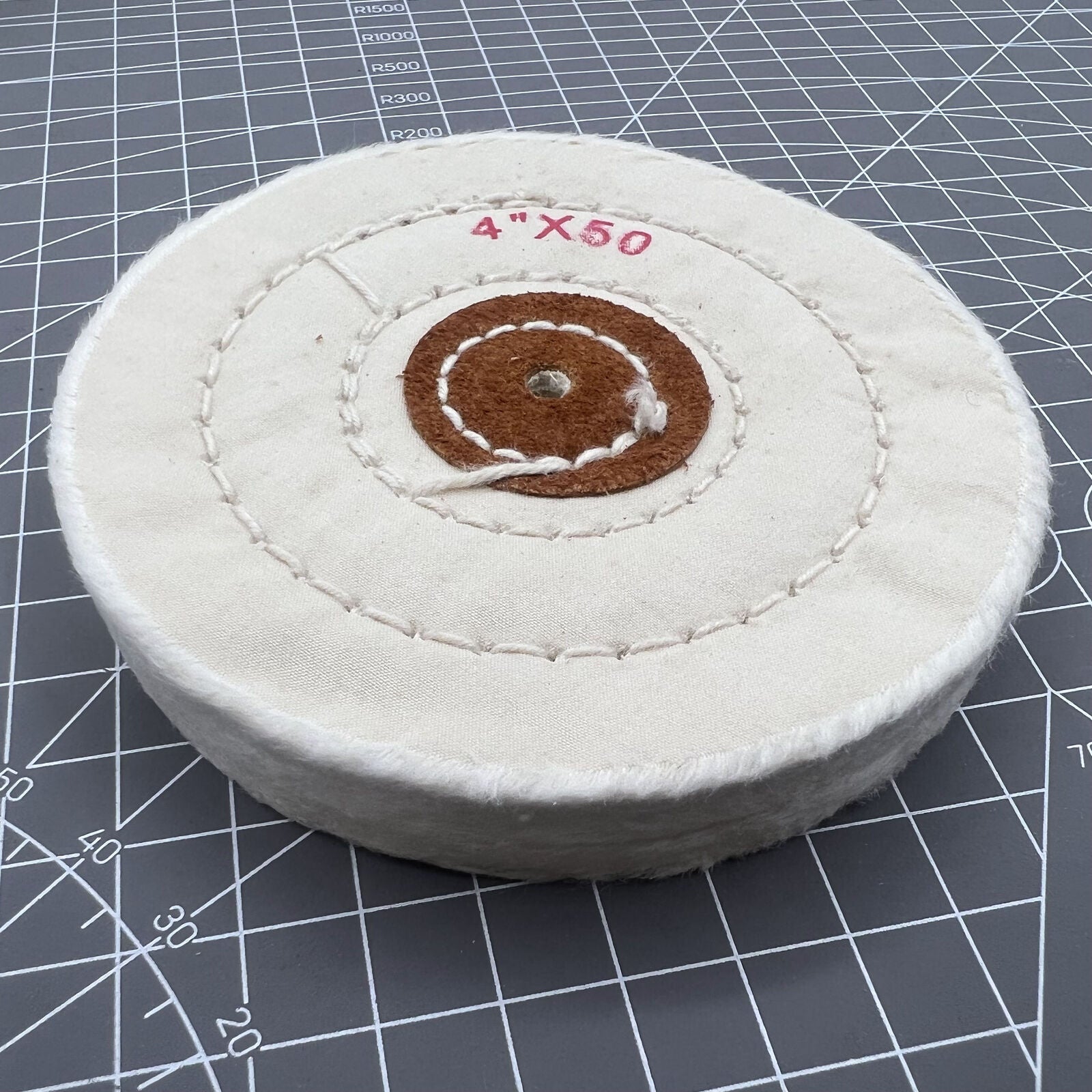 Bergeon 5175-100 white polishing buff wheel by Swiss Made for precise watch accessory cleaning.