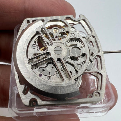 Asian HZ1C01A silver barrel-shaped watch accessory featuring automatic mechanical movement and sleek, elegant design.