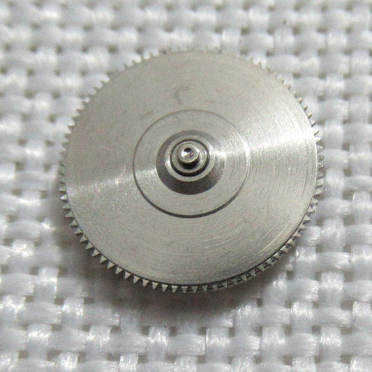 Complete barrel with new mainspring for YN55 YN56 watch movement. Durable replacement part for precise function.