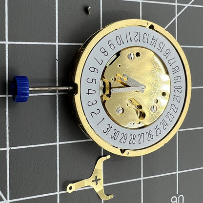 Ronda 5030D Swiss quartz watch movement with date display at 6 o'clock, perfect for watch repair and customization.