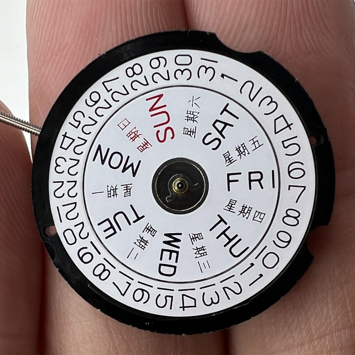 Ronda 507 quartz watch movement with Swiss parts featuring English and Chinese characters by Ronda.