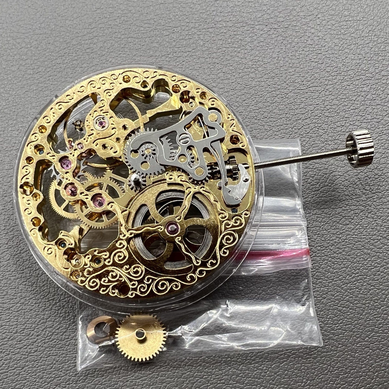 Golden Seagull ST3600 mechanical watch movement with hollow design and second hand at 9 o?clock