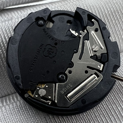 Swiss Made ETA 803.112 quartz watch with date at 6, precise 3-hand movement by ETA for reliable timekeeping.