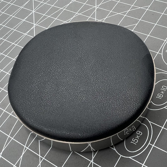Large leather watch movement cushion pad, perfect for secure watch repairs and display.