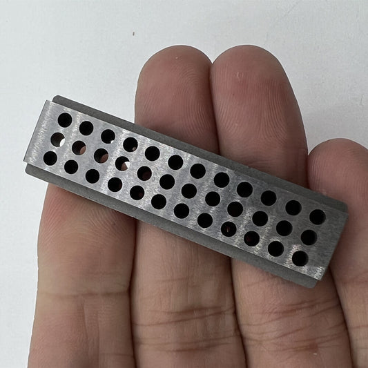 Bergeon 1902 steel staking block for precise riveting in watch accessories and repairs.