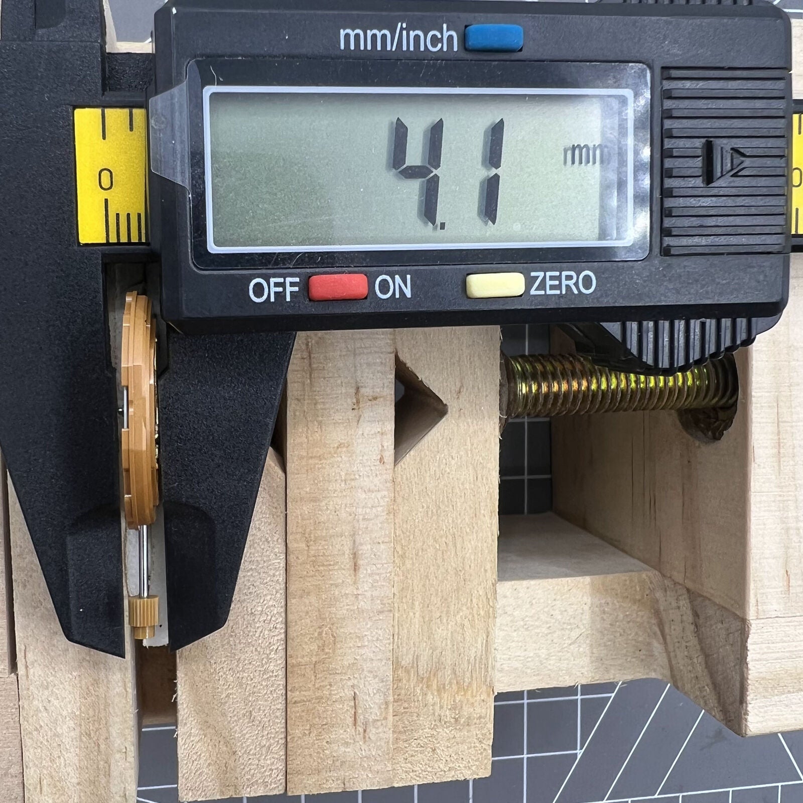 Miyota GM10 quartz watch movement with date window at 3 o'clock, precise Japan-made mechanism.