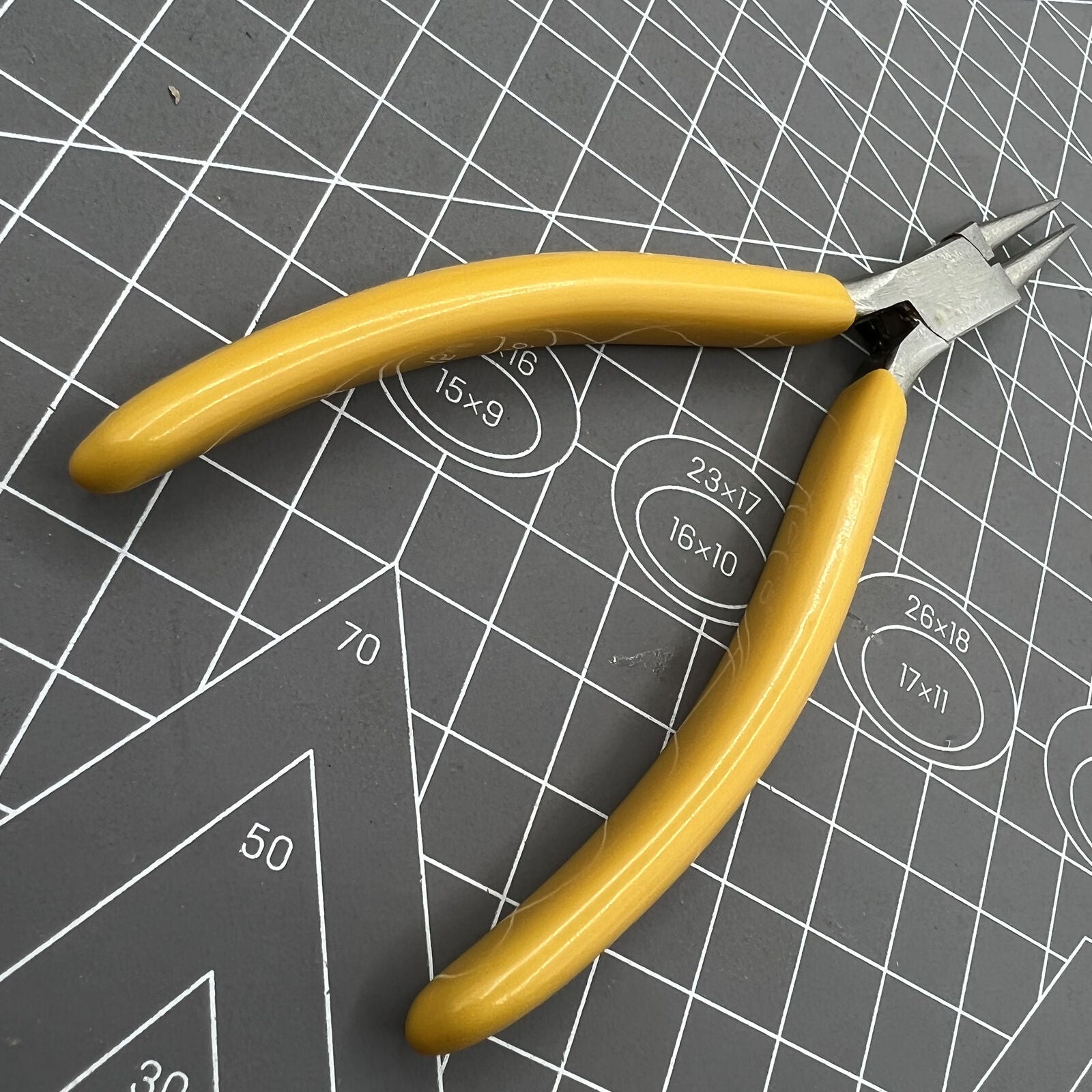 Swiss Bergeon 2512 round nose smooth jaw pliers for precise watch strap and accessory adjustments.