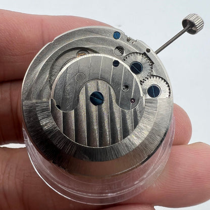 Multifunctional automatic watch featuring kinetic mechanical movement and tourbillon design.