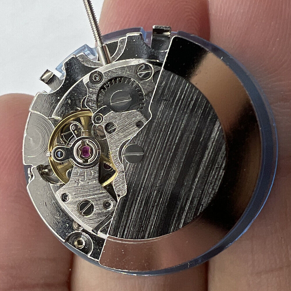 Asian Tianjin Seagull ST6 watch showing moon phase at 6 o'clock, automatic mechanical movement with 3 hands.