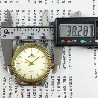 TAIHANG 38mm mechanical watch with silver dial, golden nails, round case, and 17 jewels for classic style.