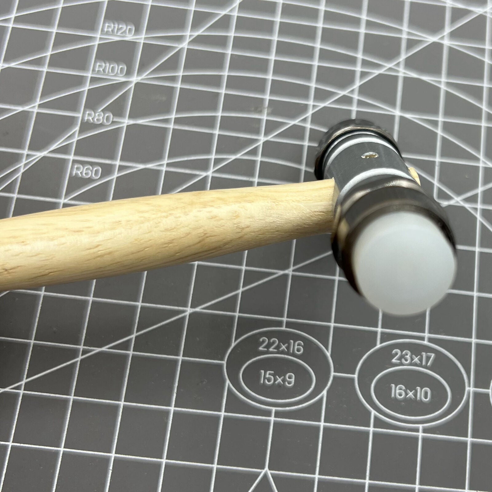 Swiss Bergeon 30417 hammer with brass and synthetic ends for precise watch accessory repairs.