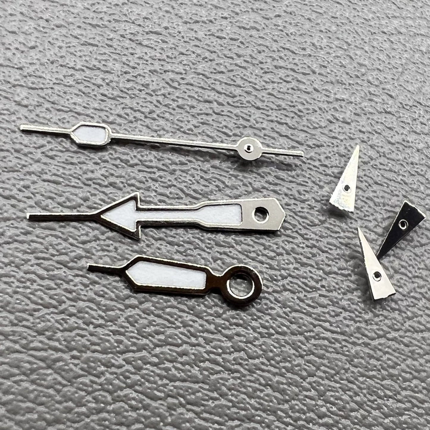 Set of 2 green lume arrow watch hands with silver trim by Miyota for OS10, OS20, OS60, OS80 models.