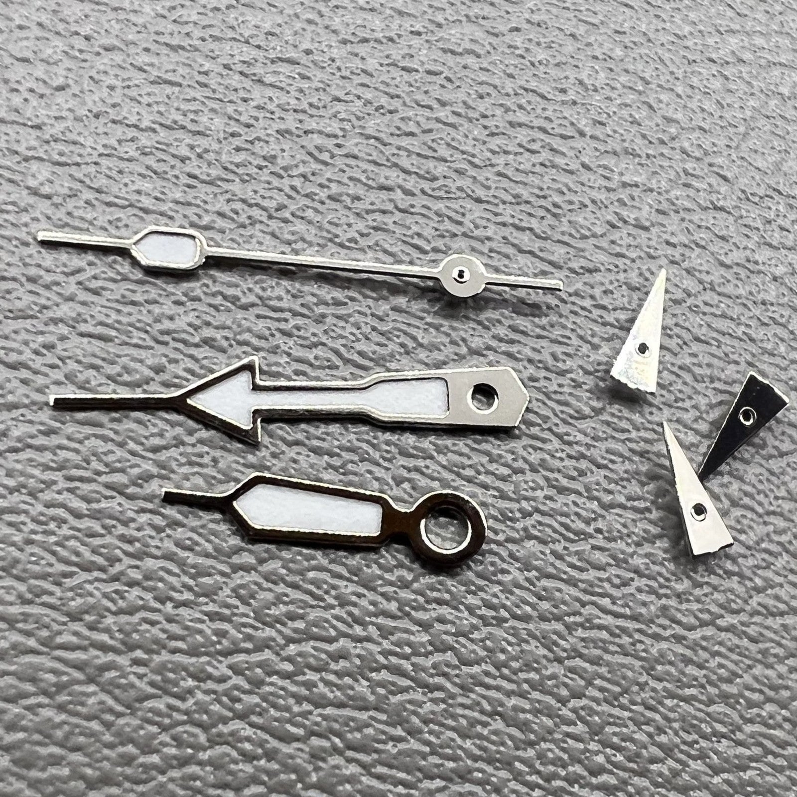 Set of 2 green lume arrow watch hands with silver trim by Miyota for OS10, OS20, OS60, OS80 models.